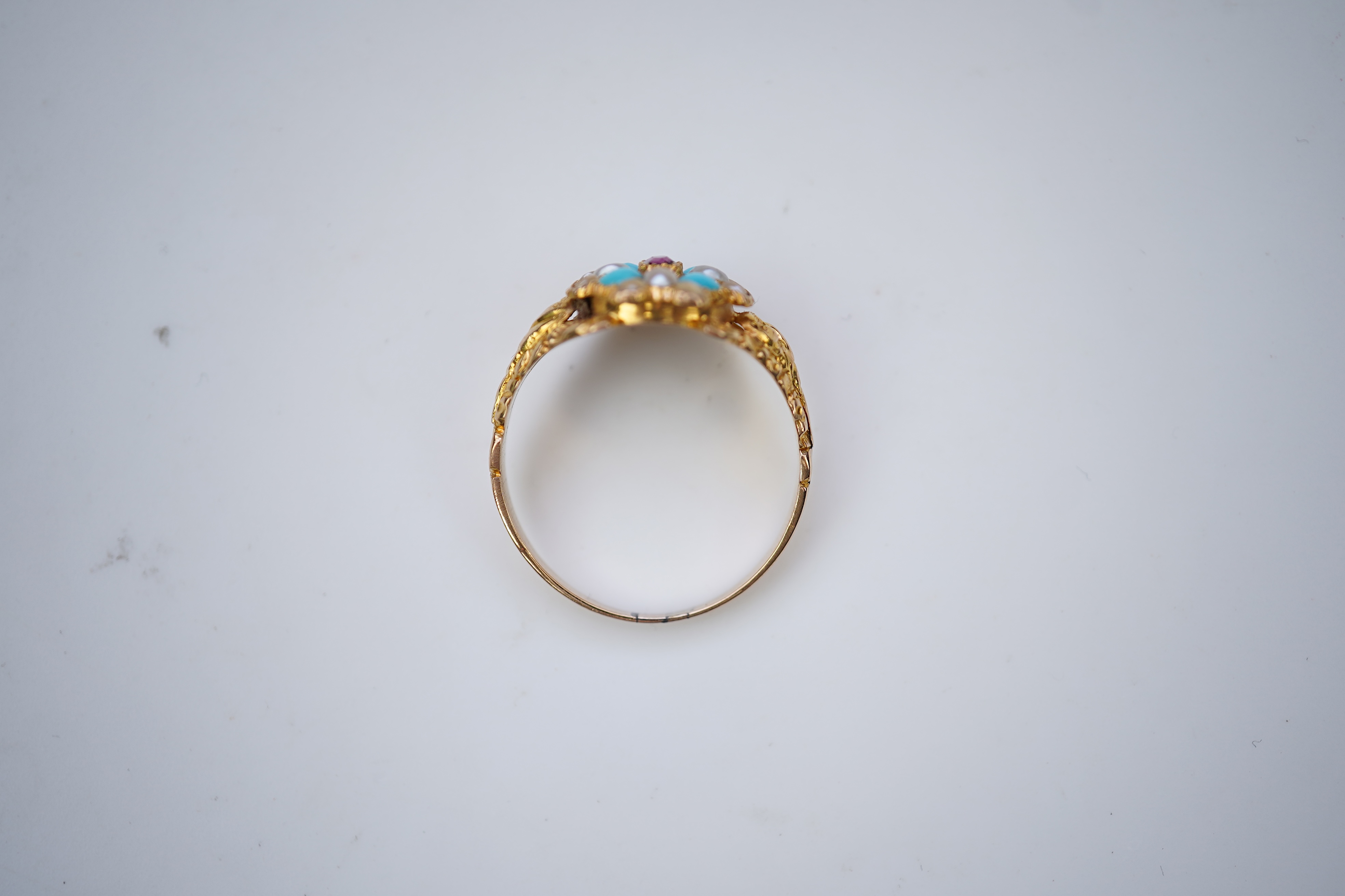 A late Georgian garnet, pearl and turquoise ring, circa 1830